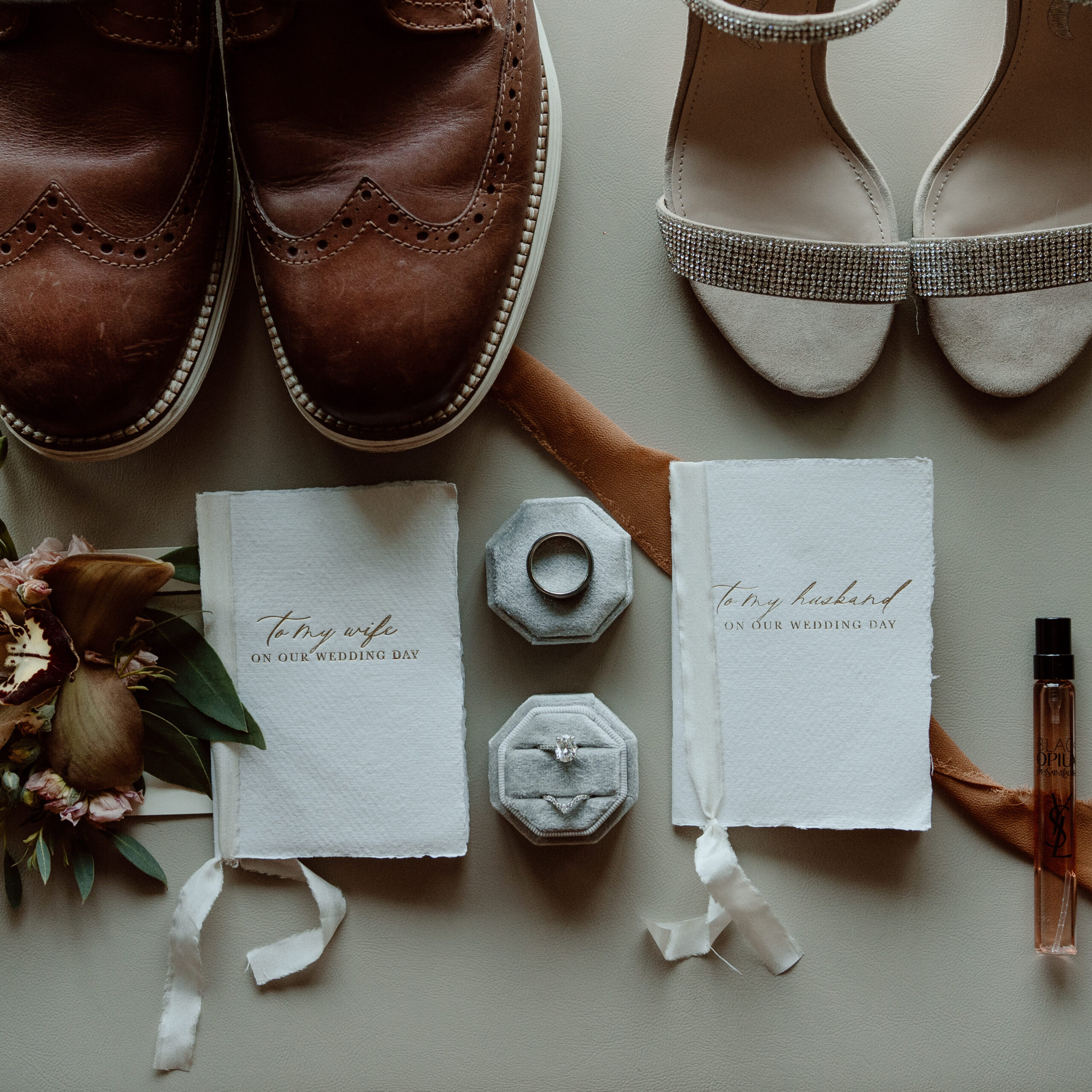 His and hers flat lay as the elopement theme for their detail flat lay
