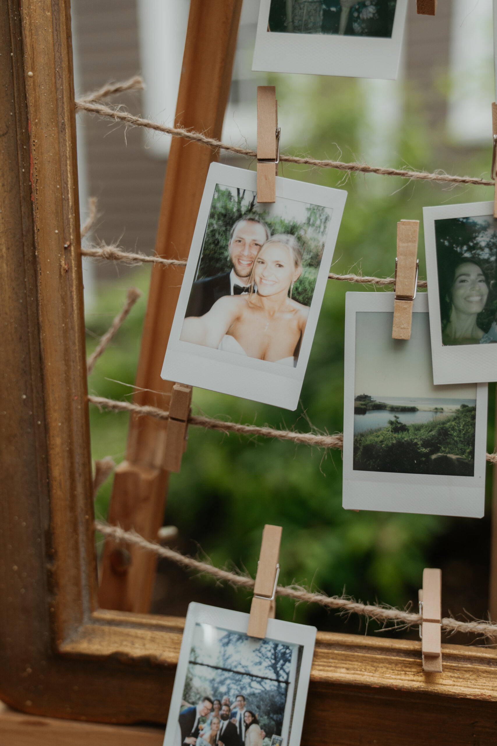 polaroid of bride and groom selfie and their summer garden party wedding during cocktail hour.